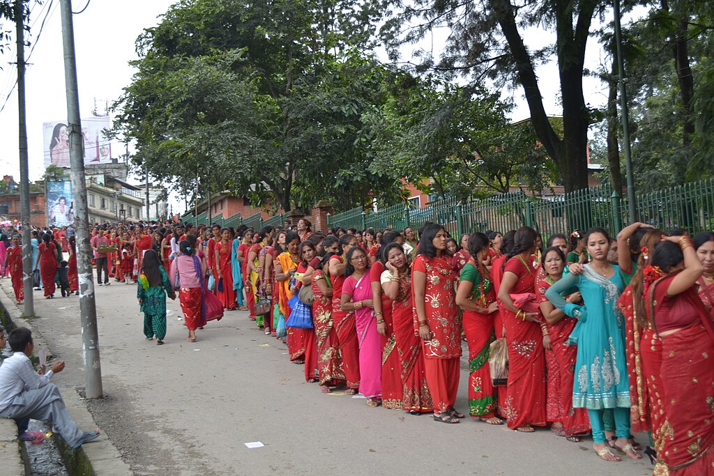 Hartalika Teej – A Women’s Festival of Nepal 2 Women line up to making offerings to Parvati and Shiva at Pashupatinath Temple