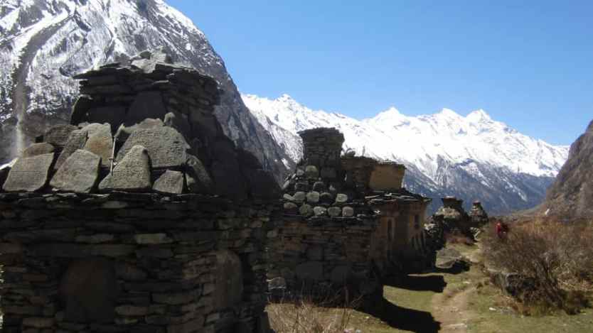 Tsum Valley: Exploring the Hidden Valley 4 Mani Bompos on the Way in Upper Tsum. Photo: Jailab Rai