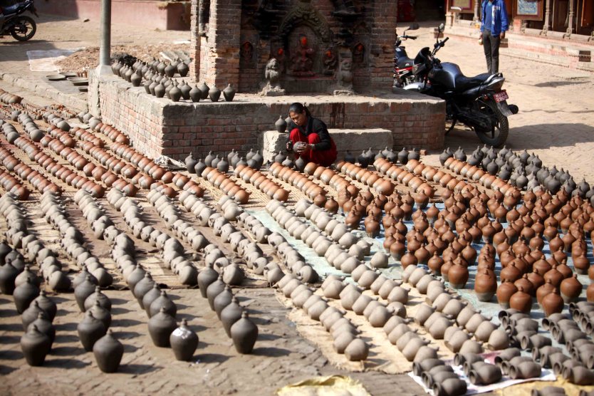 Traditional Pottery Art: A Must-do Experience in Bhaktapur 3 Earthenware is being dried in the Pottery Square in Bhaktapur.